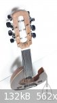 Oud moon electric luthier arabic head.jpg - 132kB